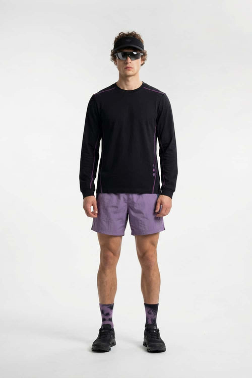 Exposed-Stitch Cotton Long-Sleeve Top in Black - full-length front modeled view