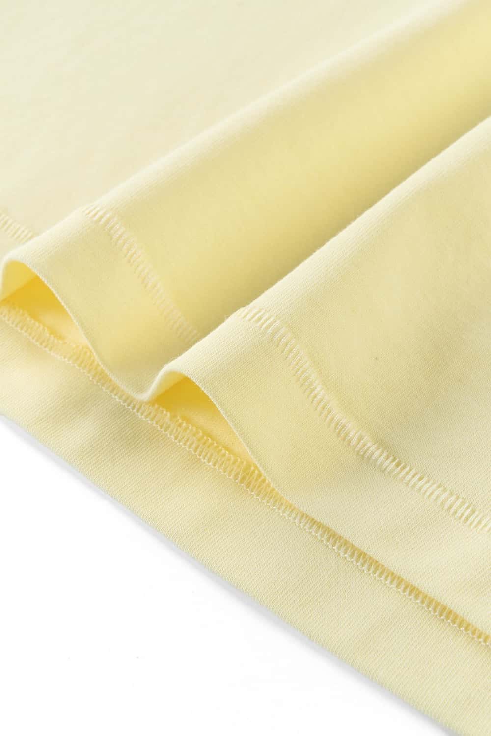 Women's High-Stretch Loop-Trim Fitted Top in Lemon Yellow - cuff and hem detail
