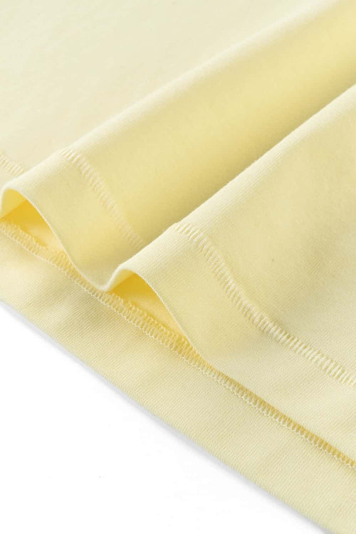 Women's High-Stretch Loop-Trim Fitted Top in Lemon Yellow - cuff and hem detail
