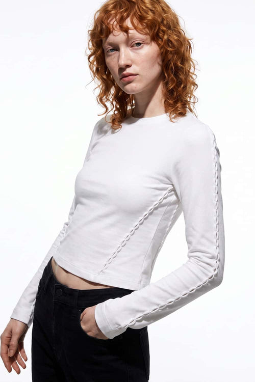 Women's High-Stretch Loop-Trim Fitted Top in White - three-quarter front modeled view