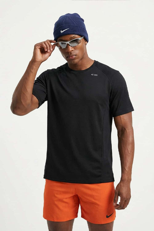 Sun-Protective Noble Run Club T-Shirt in Black - full-length front modeled view