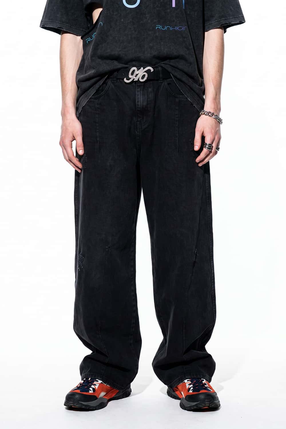 Curved-Leg Washed Cotton Pants in Black - front modeled view