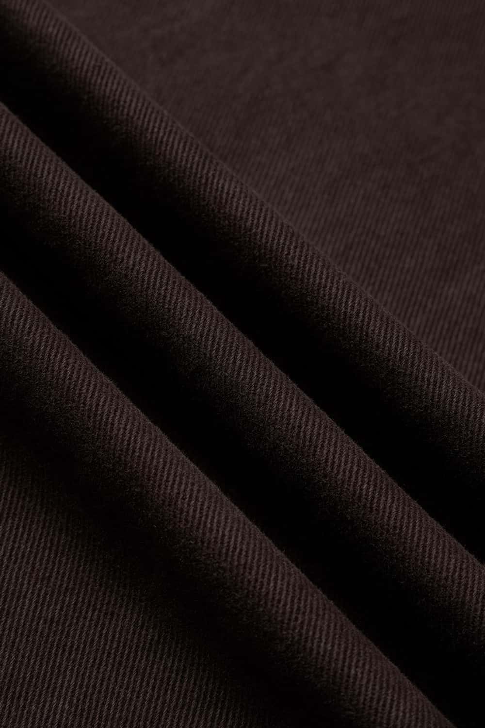 Curved-Leg Washed Cotton Pants in Coffee - fabric texture close-up