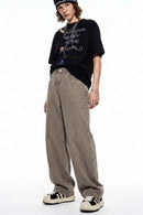 Curved-Leg Washed Cotton Pants in Khaki - full-length front modeled view