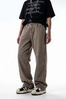 Curved-Leg Washed Cotton Pants in Khaki - front modeled view
