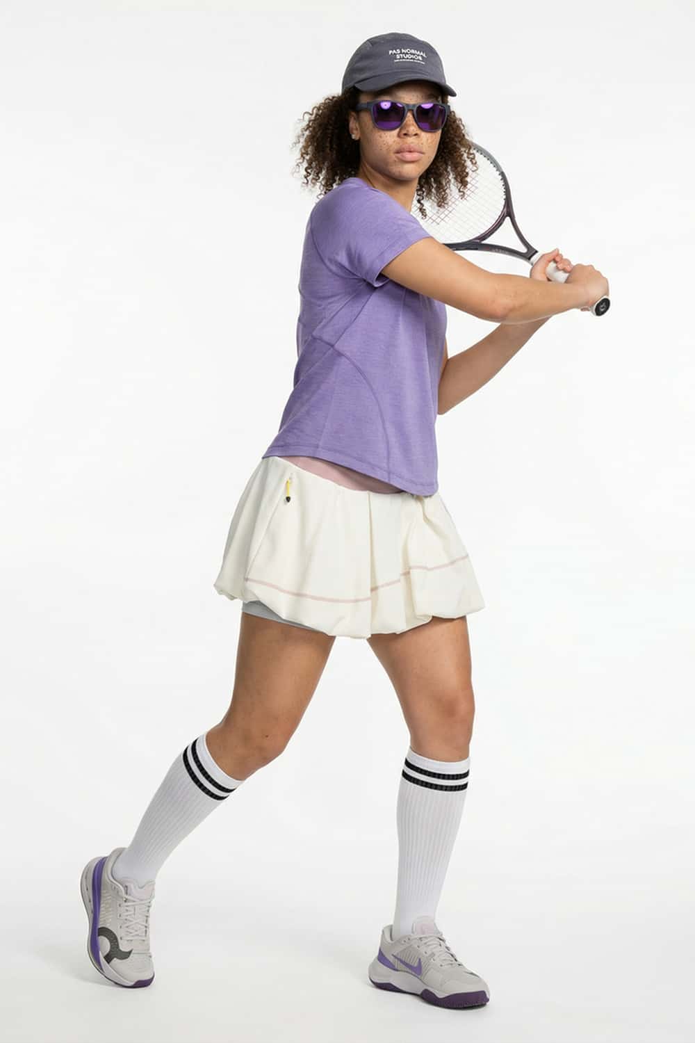 Gathered Skort with Built-In Shorts in Beige - three-quarter front modeled view