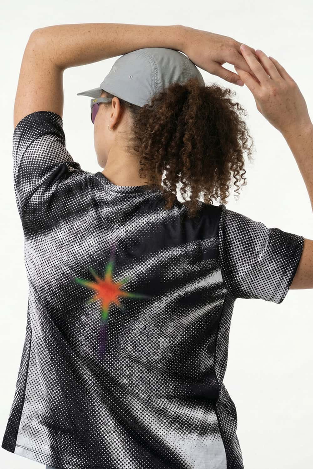 Breathable Stretch T-Shirt with Planet Graphics in Charcoal - back modeled view