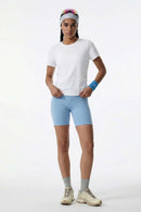 Cool-Touch Ruched-Side Fitted T-Shirt in Off White - full-length front modeled view