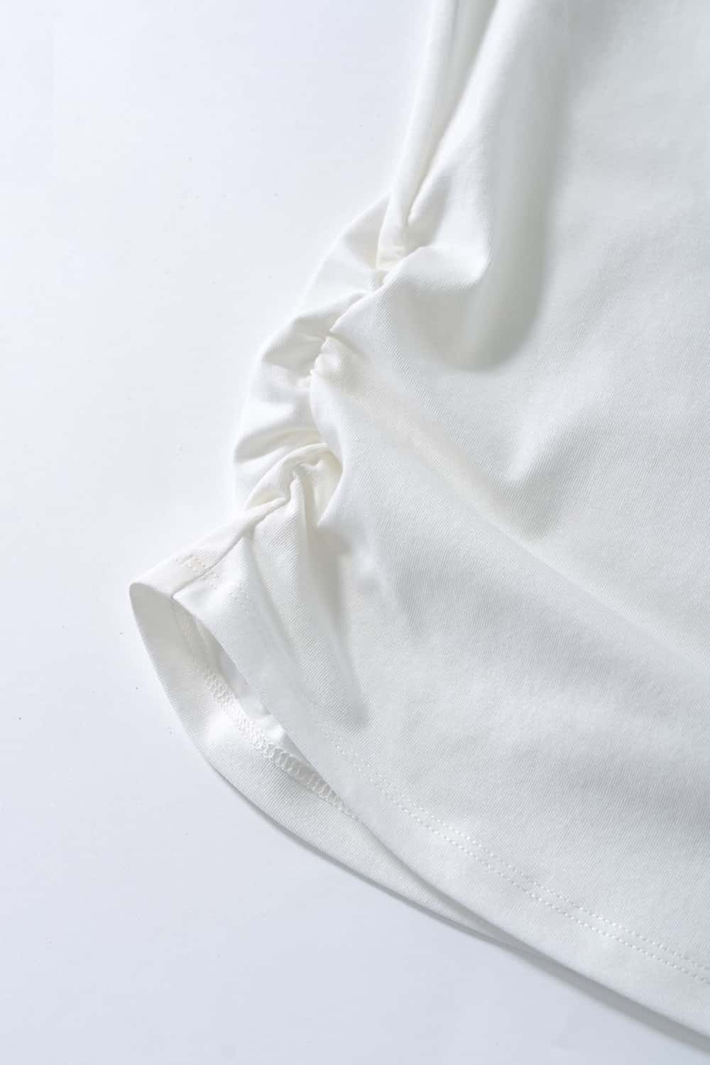 Cool-Touch Ruched-Side Fitted T-Shirt in Off White - hem detail