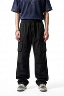 Drawstring Wide-Leg Cargo Trousers in Black - front modeled view
