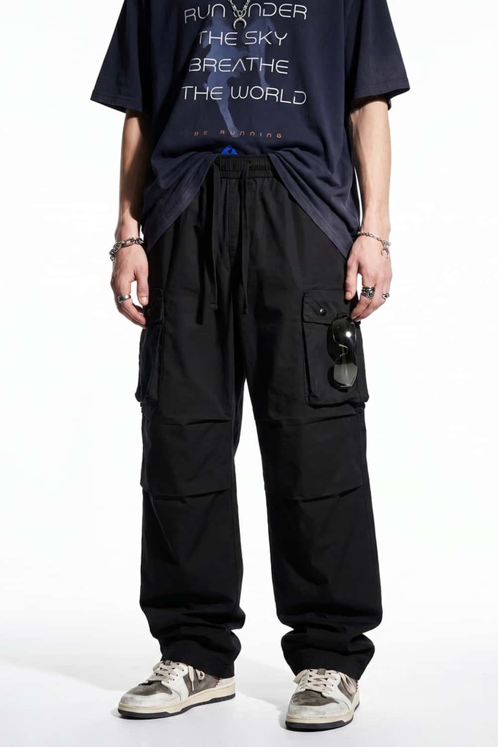 Drawstring Wide-Leg Cargo Trousers in Black - front modeled view