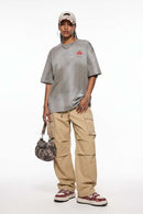 Drawstring Wide-Leg Cargo Trousers in Khaki - full-length front modeled view