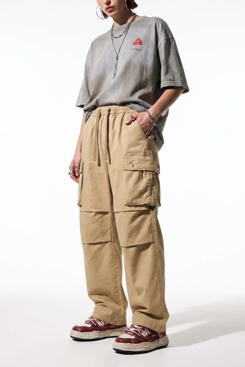 Drawstring Wide-Leg Cargo Trousers in Khaki - three-quarter front modeled view