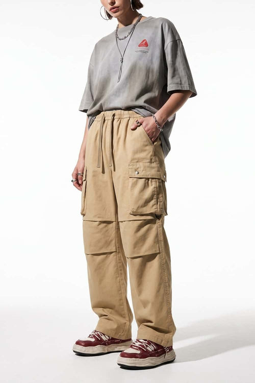 Drawstring Wide-Leg Cargo Trousers in Khaki - three-quarter front modeled view