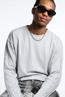 High-Stretch Loop-Trim Long-Sleeve T-Shirt in Grayish White - front modeled close-up