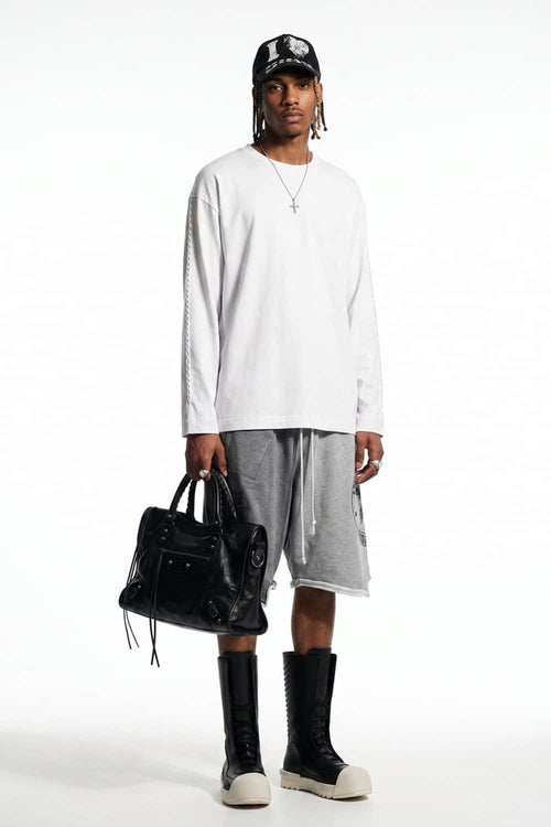 High-Stretch Loop-Trim Long-Sleeve T-Shirt in White - full-length front modeled view
