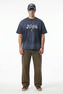 Distressed Floral Graphic Cotton T-Shirt in Dark Gray - full-length front modeled view