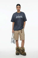 Distressed Floral Graphic Cotton T-Shirt in Dark Gray - full-length front modeled view