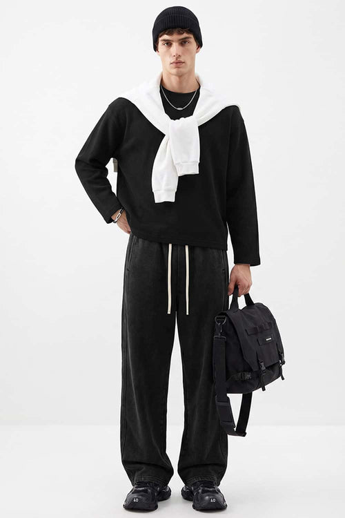 Waffle-Texture Long-Sleeve Top in Black - full-length front modeled view