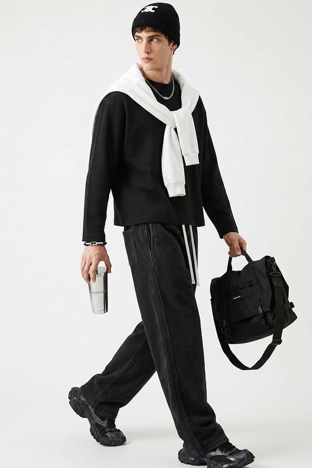 Waffle-Texture Long-Sleeve Top in Black - three-quarter front modeled view