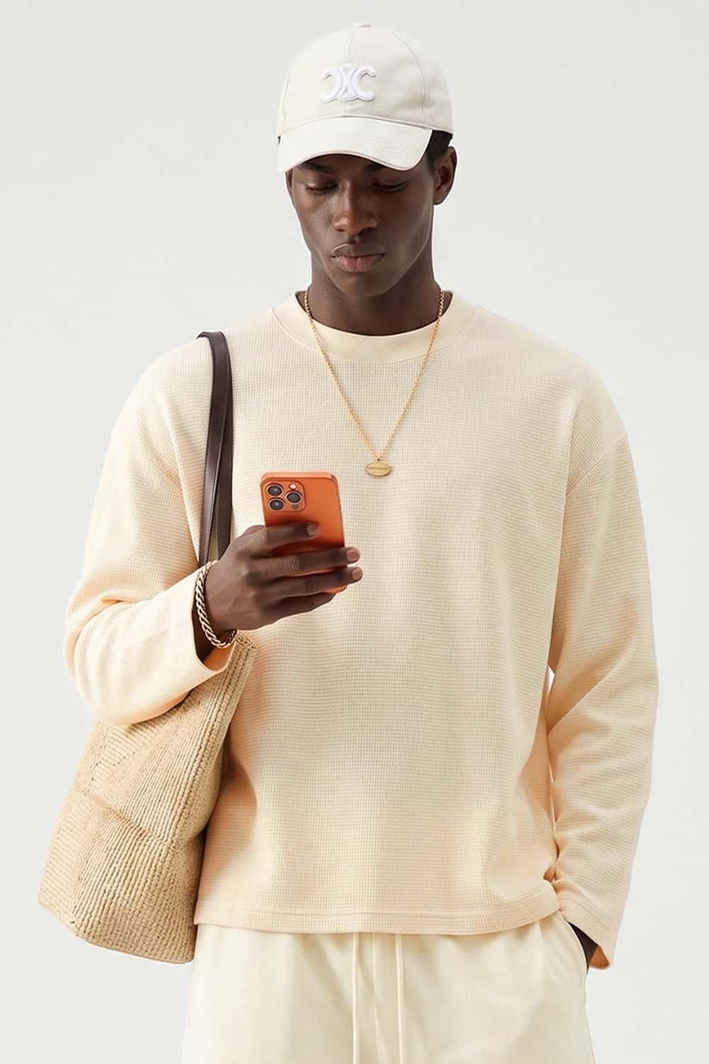 Waffle-Texture Long-Sleeve Top in Cream Apricot - front modeled view
