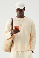 Waffle-Texture Long-Sleeve Top in Cream Apricot - front modeled view