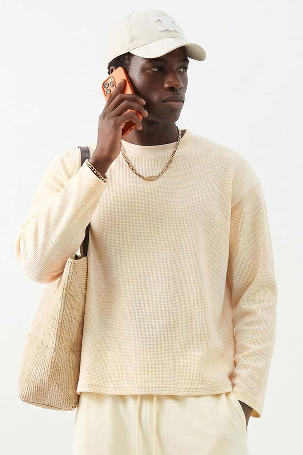 Waffle-Texture Long-Sleeve Top in Cream Apricot - front modeled view