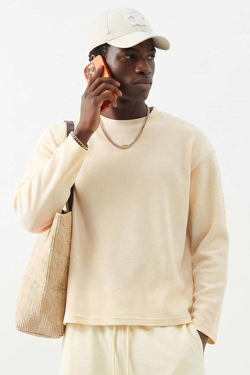 Waffle-Texture Long-Sleeve Top in Cream Apricot - front modeled view