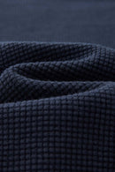 Waffle-Texture Long-Sleeve Top in Navy Blue - fabric texture close-up
