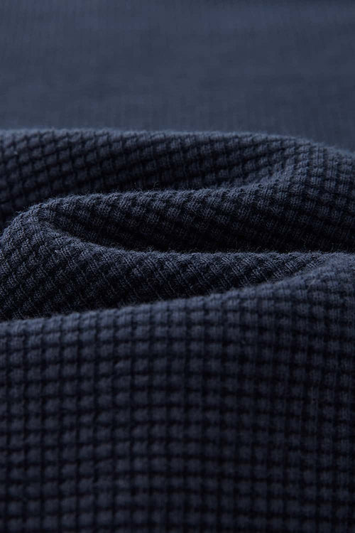 Waffle-Texture Long-Sleeve Top in Navy Blue - fabric texture close-up