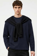 Waffle-Texture Long-Sleeve Top in Navy Blue - front modeled view