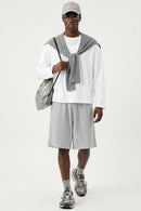 Waffle-Texture Long-Sleeve Top in White - full-length front modeled view