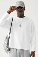 Waffle-Texture Long-Sleeve Top in White - front modeled view
