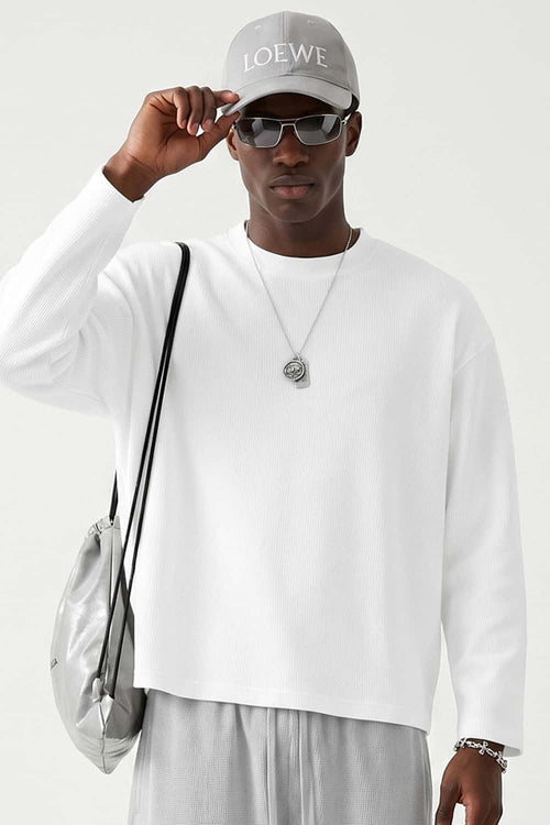 Waffle-Texture Long-Sleeve Top in White - front modeled view