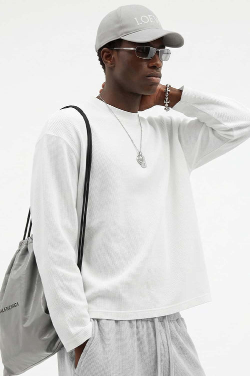 Waffle-Texture Long-Sleeve Top in White - three-quarter front modeled view