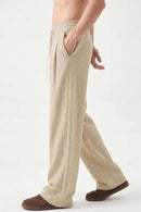Heavyweight Wide-Leg Trousers in Apricot - three-quarter front modeled view