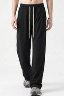 Heavyweight Wide-Leg Trousers in Black - front modeled view