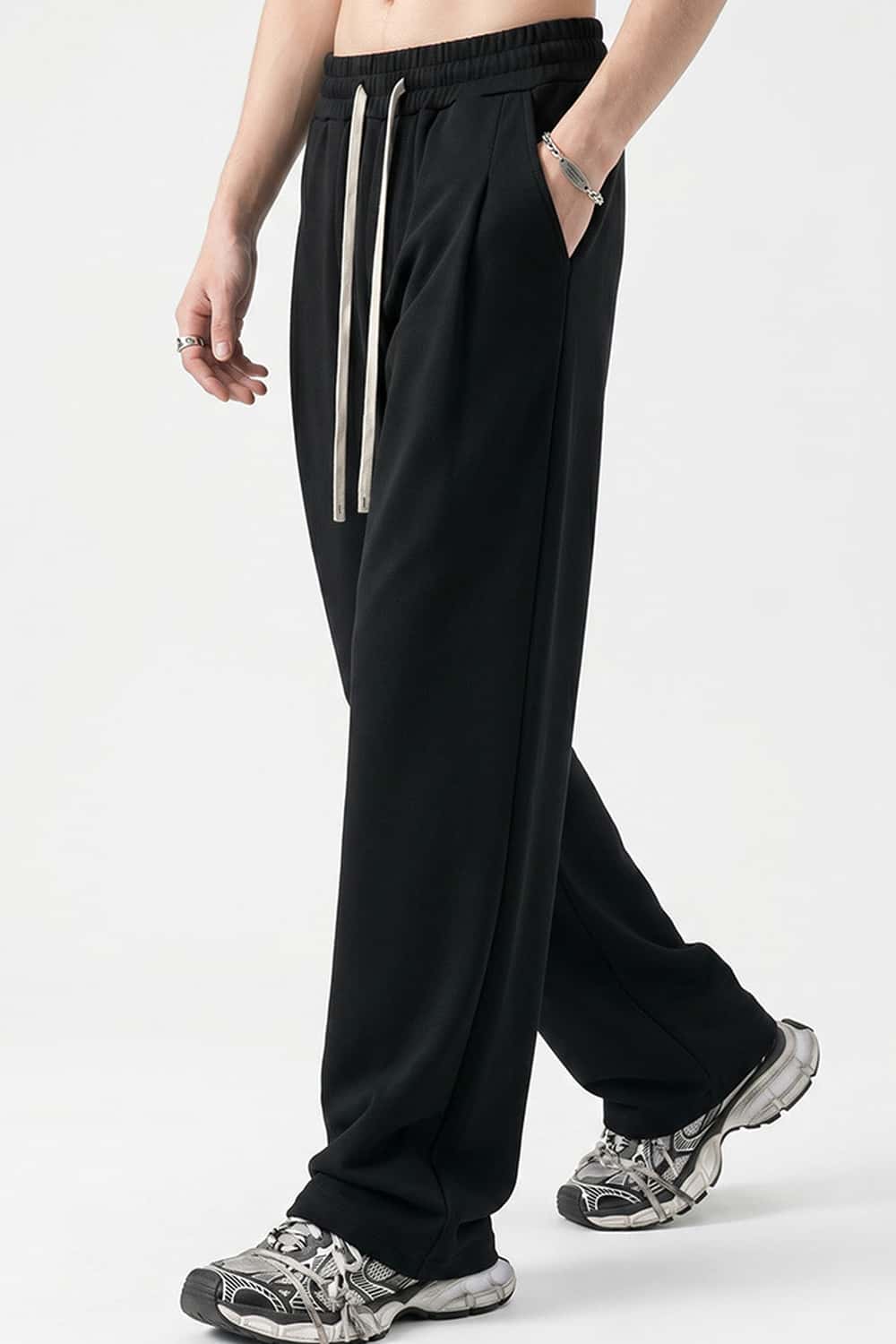 Heavyweight Wide-Leg Trousers in Black - three-quarter front modeled view
