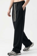 Heavyweight Wide-Leg Trousers in Black - three-quarter front modeled view
