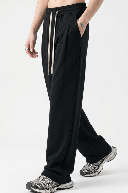 Heavyweight Wide-Leg Trousers in Black - three-quarter front modeled view