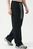 Heavyweight Wide-Leg Trousers in Black - front modeled view