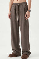 Heavyweight Wide-Leg Trousers in Coffee - three-quarter front modeled view