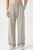 Heavyweight Wide-Leg Trousers in Oat Gray - front modeled view