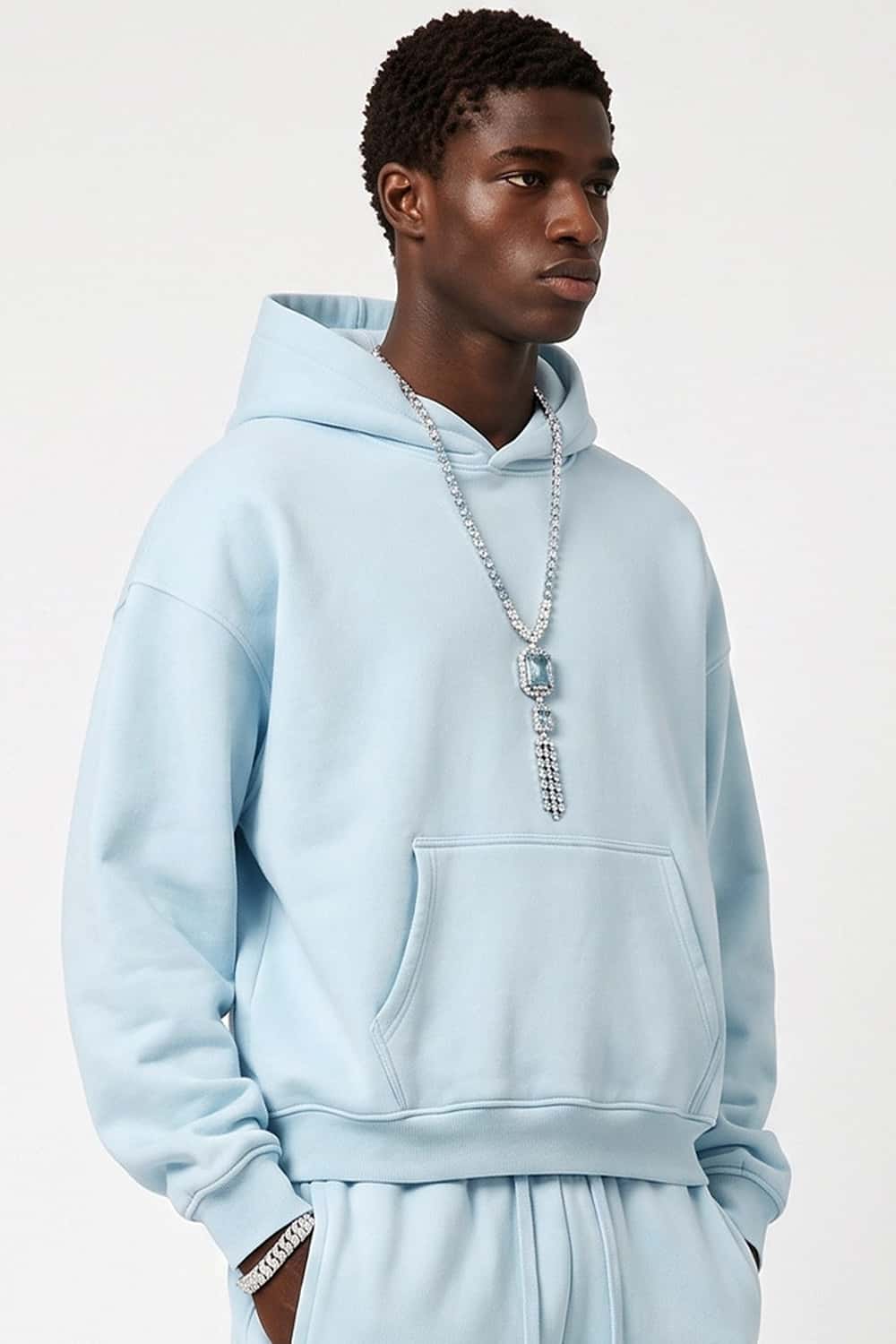 Fleece-Lined Boxy Pullover Hoodie in Baby Blue - three-quarter front modeled view
