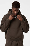 Fleece-Lined Boxy Pullover Hoodie in Brown - front modeled view