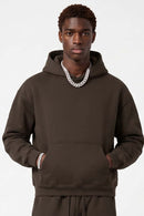 Fleece-Lined Boxy Pullover Hoodie in Brown - front modeled view