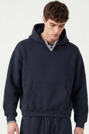 Fleece-Lined Boxy Pullover Hoodie in Midnight Blue - front modeled view