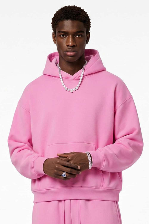 Fleece-Lined Boxy Pullover Hoodie in Pink - front modeled view
