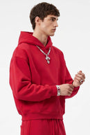 Fleece-Lined Boxy Pullover Hoodie in Red - three-quarter front modeled view