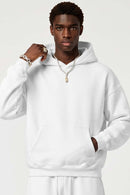 Fleece-Lined Boxy Pullover Hoodie in White - three-quarter front modeled view
